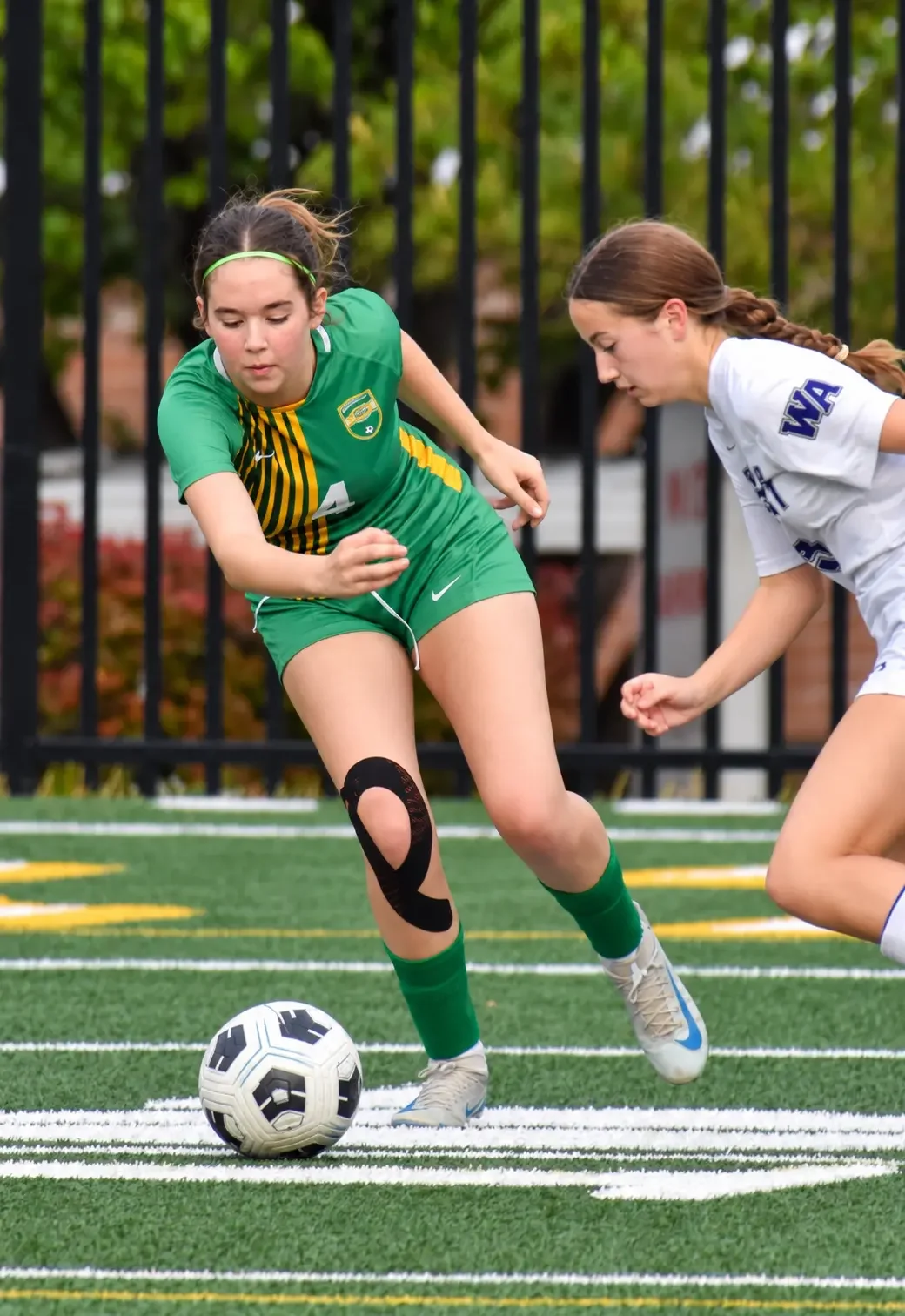 Catherine Page playing soccer